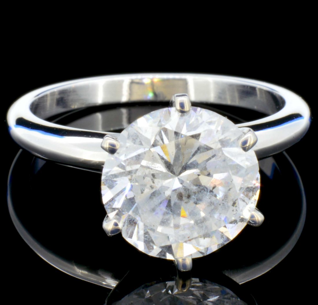 14K White Gold 3.52ct Diamond Solitaire Ring: Estimated Retail: $125,200.00 Ref: WAG50080 Diamonds: Natural Diamonds Quantity: 1 counts Shape: Round Brilliant Weight: 3.52cts. Clarity Grade: I1 Color Grade: E