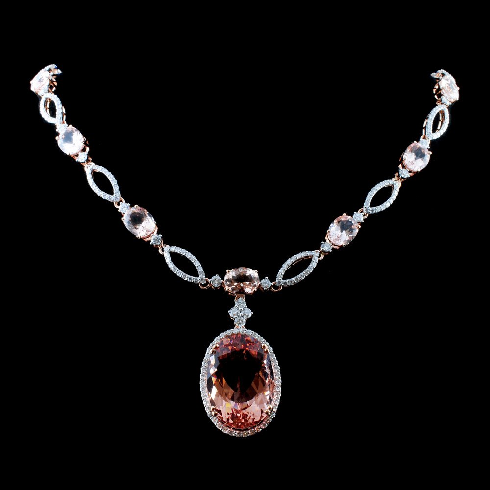 14K Gold 37.07ct Morganite & 4.25ct Diamond Neckla: Estimated Retail Replacement Value: $51,000.00 Ref: WAG20400 Item no.: FA010134-N2062AMG Gold Content: 14K Rose Gold Weight of Item: 27.35 grams Size: 16.5 Main Gemstone: Natural Morg