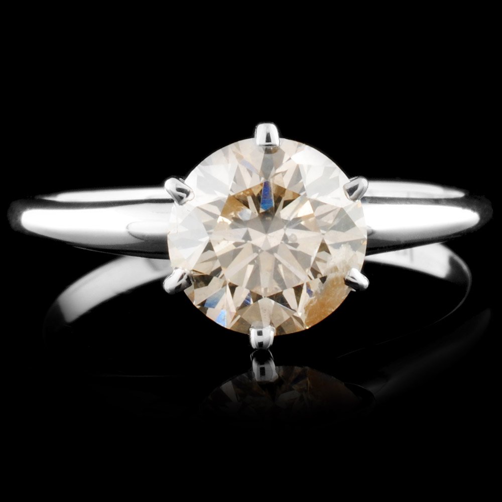 14K Gold 1.34ct Solitaire Diamond Ring: Estimated Retail Replacement Value: $9,450.00 Ref: WAG3780 Item no.: FA2054658016-SO1647-1.34 Specification: Gold Content: 14K White Gold Weight of Item: 1.9 grams Country Made: U.S.A. Ring size: 7 Ma