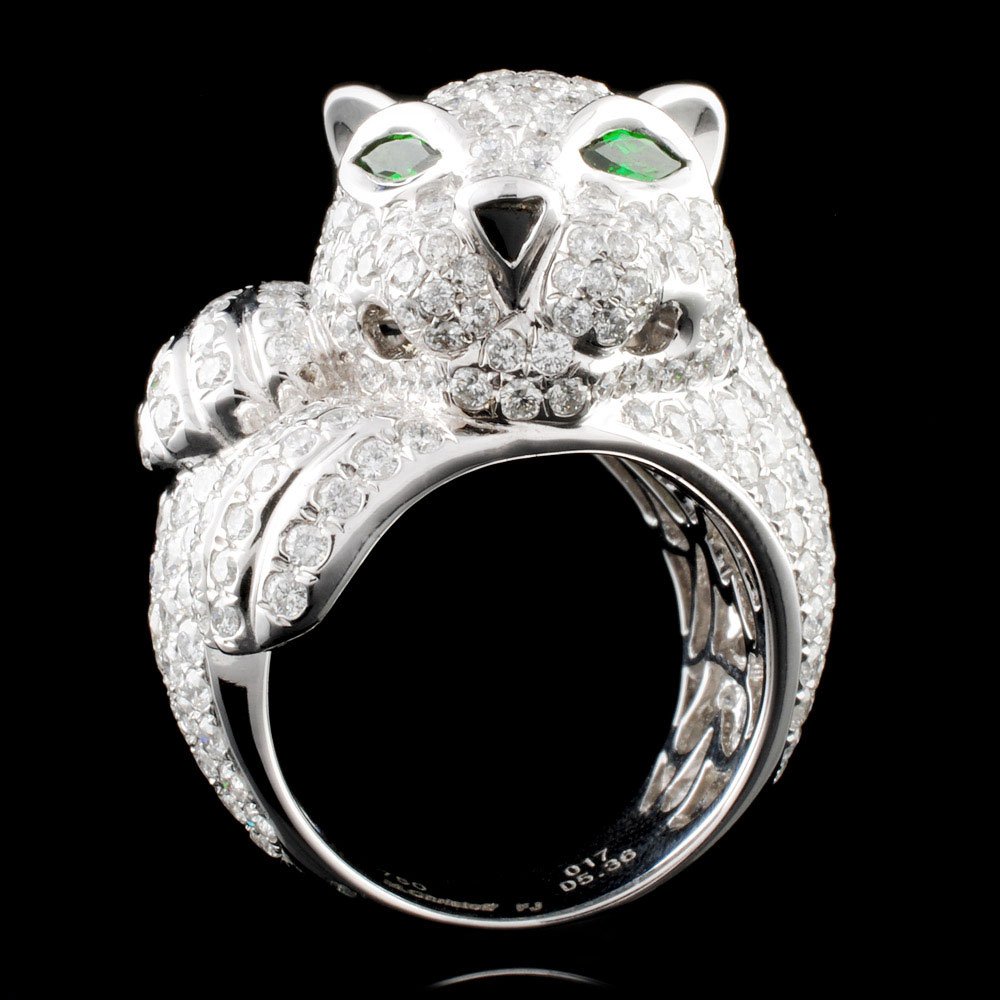 18K Gold 0.17ctw Tsavorite & 5.36ctw Diamond Ring: Estimated Retail Replacement Value: $44,325.00 Ref: WAG15000 Item no.: ARA7072 Specification: Gold Content: Solid 18K White Gold Weight of Item: 16.70 grams Size: 6.5 Country Made: U.S.A Main Gemstone