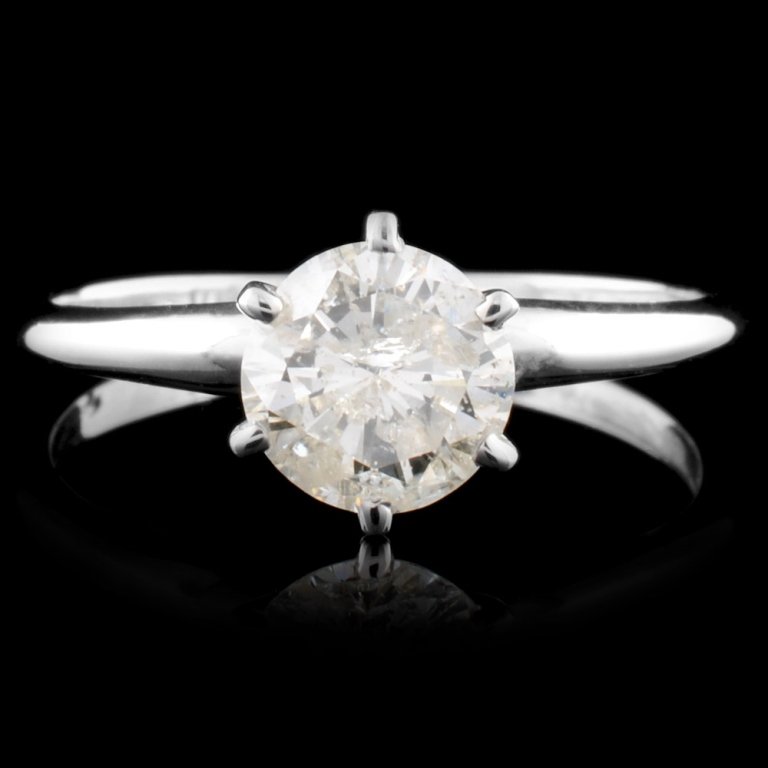 14K Gold 0.92ct Solitaire Diamond Ring: Estimated Retail Replacement Value: $5,400.00 Ref: WAG2160 Item no.: FA2054658017-SO1650-0.92 Specification: Gold Content: 14K White Gold Weight of Item: 1.7 grams Country Made: U.S.A. Ring size: 7 Ma