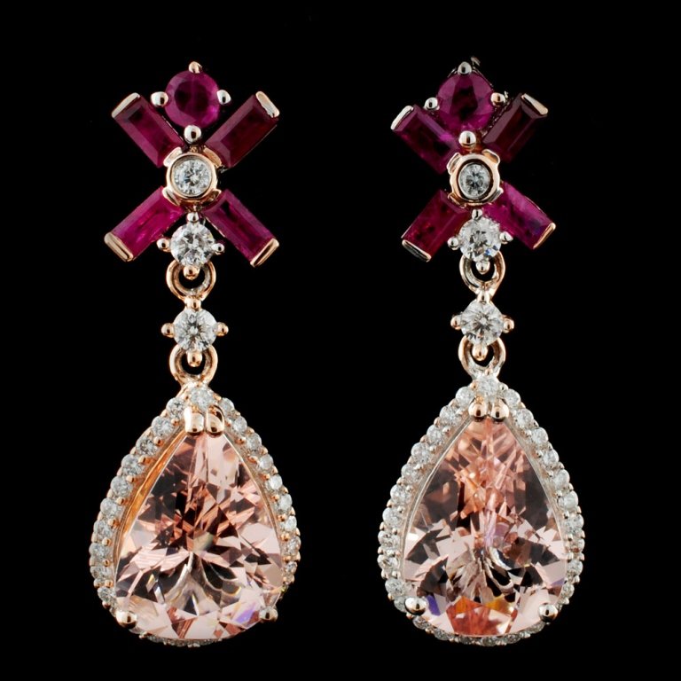 14K Gold 6.50ct Morganite & 0.67ctw Diamond Earrin: Estimated Retail Replacement Value: $9,060.00 Ref: WAG3624 Item no.: FA2053377016-E3737AMG Gold Content: 14K Rose Gold Weight of Item: 5.50 grams Main Gemstone: Natural Morganite Shape: Pear cut Quant