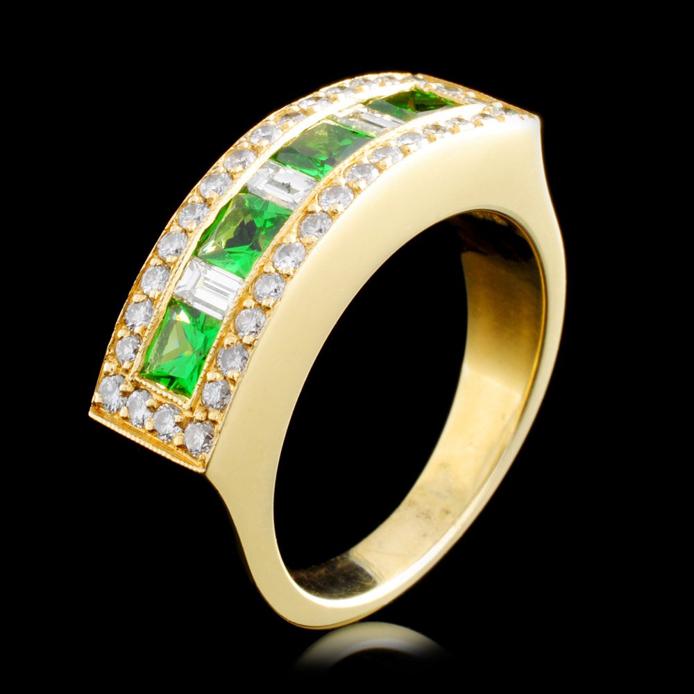 18K Gold 1.14ctw Tsavorite & 0.73ctw Diamond Ring: Estimated Retail Replacement Value: $7,000.00Ref: WAG4000Item no.: EJO008Specification:Gold Content: Solid 18K Yellow GoldWeight of Item: 8.60 gramsCountry Made: U.S.A.Ring size: 6.75Main Gemstone: Na