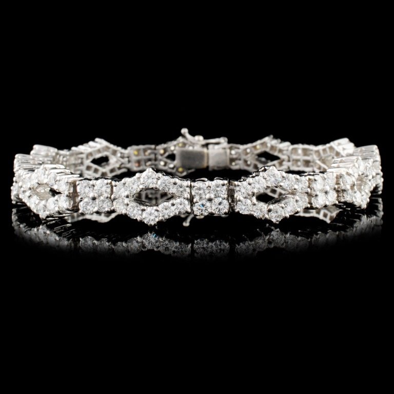18K Gold 8.12ctw Diamond Bracelet: Estimated Retail Replacement Value: $54,600.00Ref: WAG31200Item no.: EJQ017Specification:Gold Content: Solid 18K White GoldWeight of Item: 34.60 gramsCountry Made: U.S.A.Size: 7 inchesMain Gemstone: N