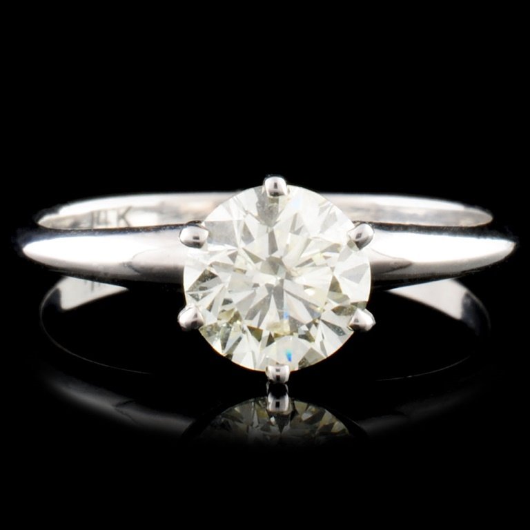14K Gold 1.01ctw Solitaire Diamond Ring: Estimated Retail Replacement Value: $17,500.00 Ref: WAG10000 Item no.: FA2056058023 - SO1558 Specification: Gold Content: 14K White Gold Weight of Item: 2.00 grams Country Made: USA Ring Size: 7 Main 