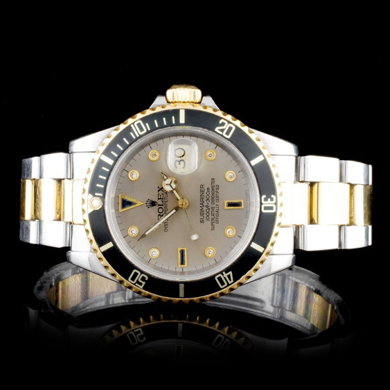 Rolex Two-Tone Submariner Diamond Men's Watch: Estimated Retail Replacement Value: $18,000.00Ref: WAG26000Item no.: ARXP001Specification:Documents: Appraisal ReportModel: Rolex Two-Tone Submariner WatchMovement: Perpetual, Self-winding, 31- Jewel