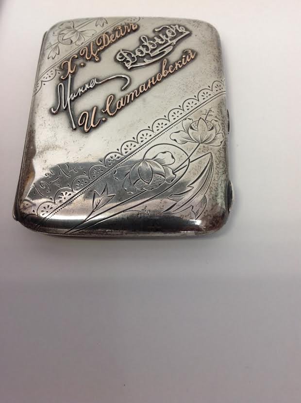A Russian Antique Silver Box: A Russian antique silver cigarette box with gold writing. (id-614141)