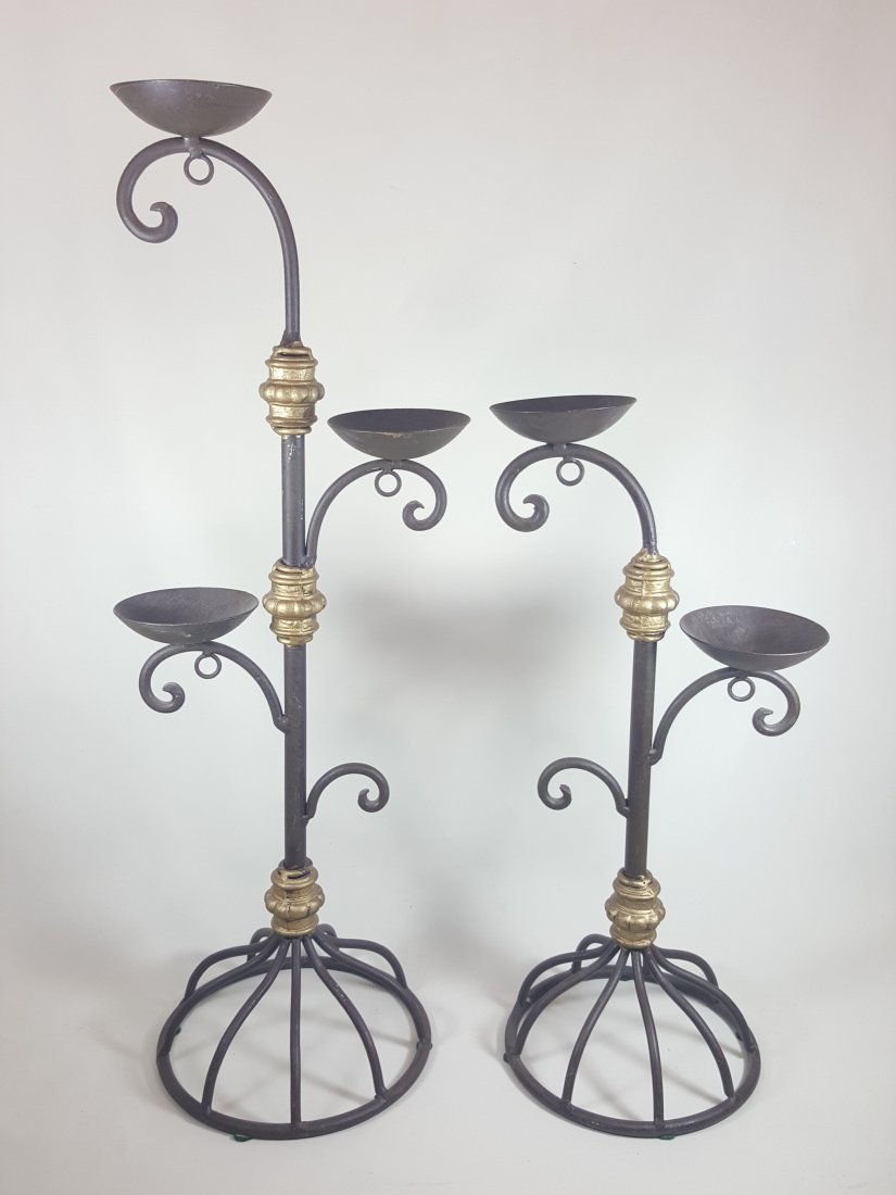 A pair of bronze candle holders (1 of 2)
