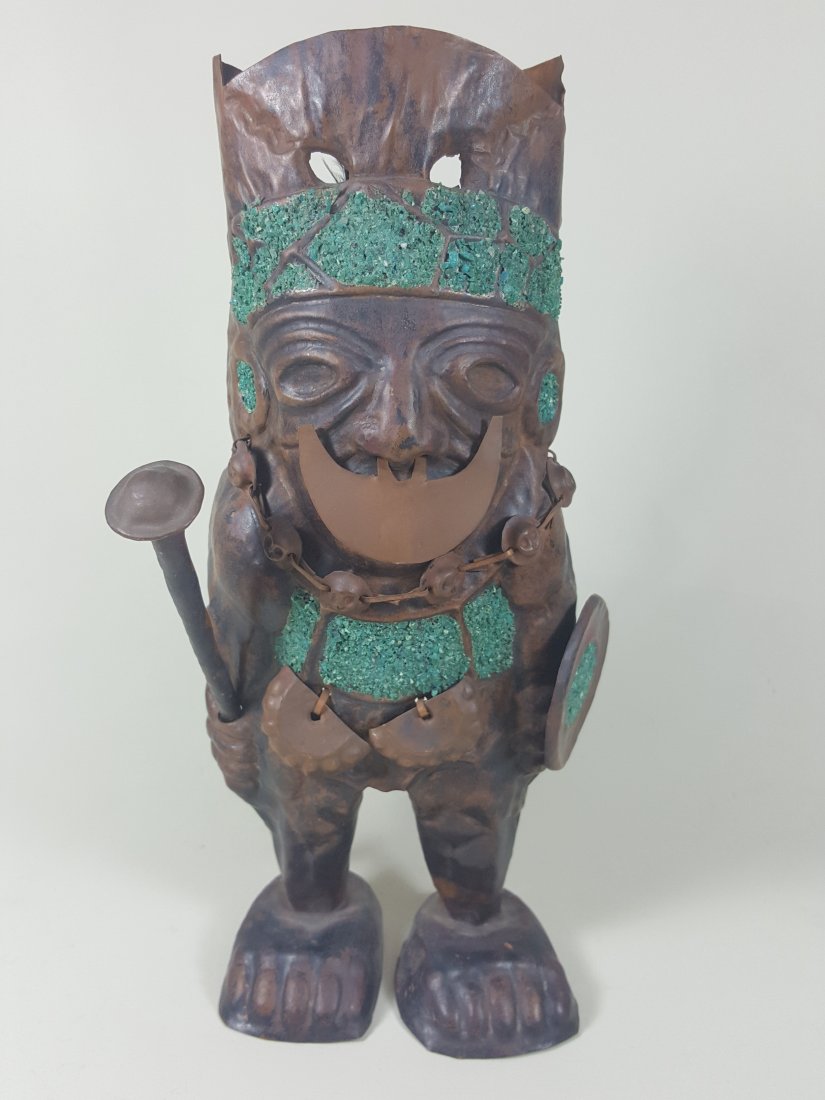 A sheet metal tribal medicine figure (1 of 2)