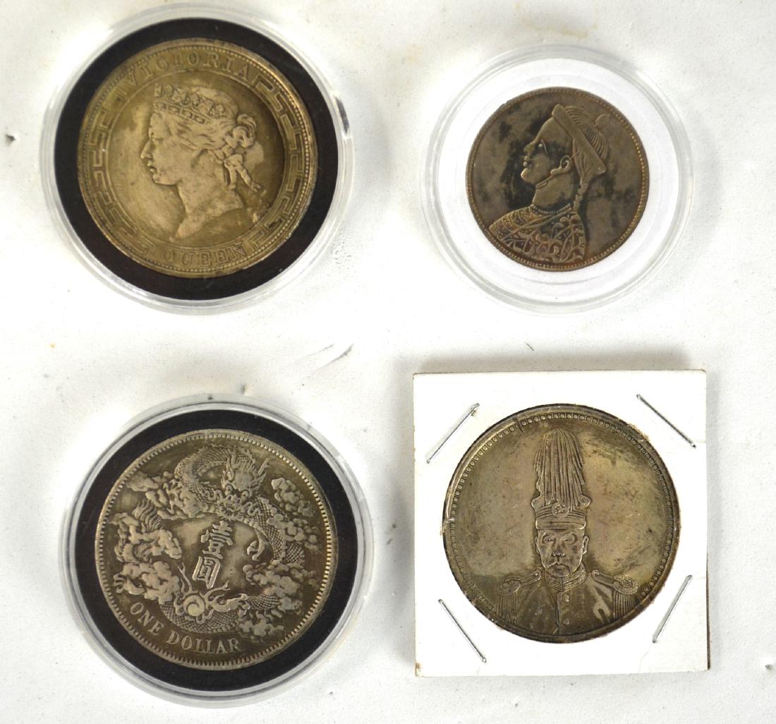Four Chinese Silver Coins (1 of 9)
