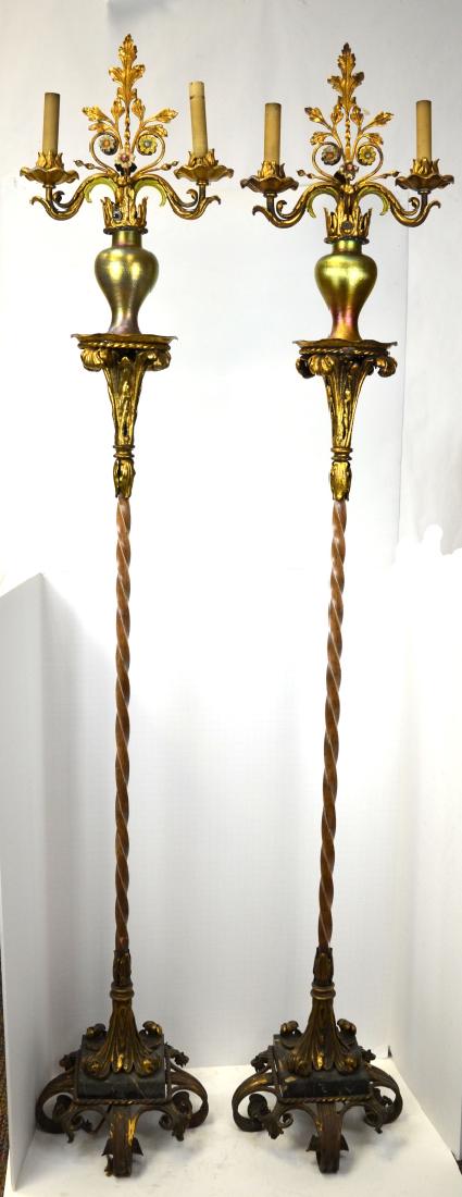 Pr of Jorchere w Tiffany Style Vase Floor Lamps: Pair of tall Jorchere floor lamps with two-lite arms on top of Tiffany Studio style vase.The gold vases are STEUBEN AURENE, Overall 5 feet 8" H x 12" W, base 11" x 11", a crack on the square black mar