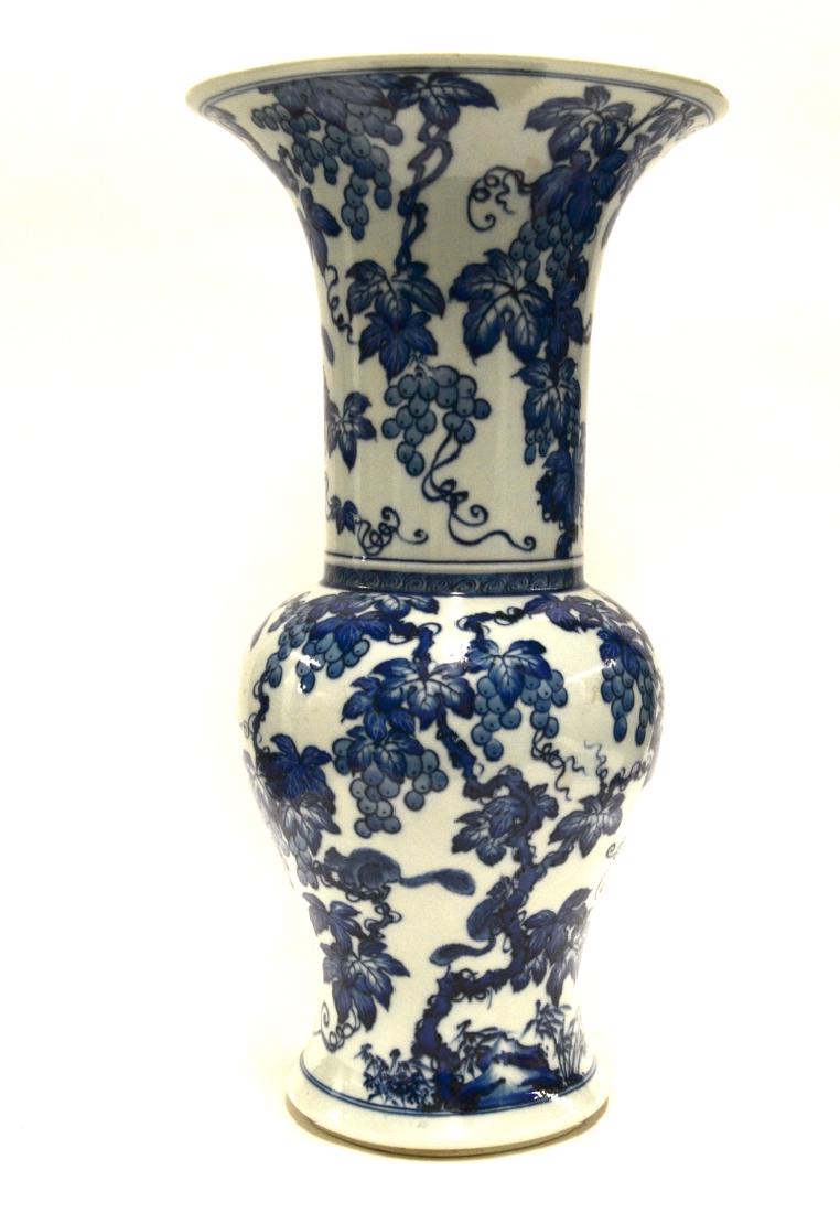 Chinese Blue & White Vase: Qing dynasty. Chinese blue and white phoenix tail vase decorated with squirrel, grapes and vines.17 1/4"H