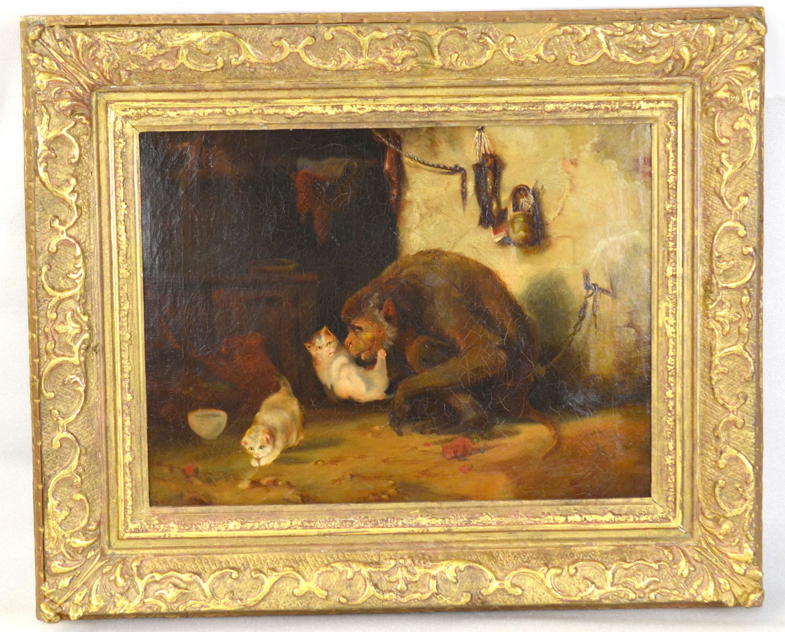 Framed Oil Painting on Board: Antique framed fine oil painting on board painted with a monkey and two cats unsigned. frame size: 23"W x 18 3/4"H, painting size: 12 1/2"H x 16"W