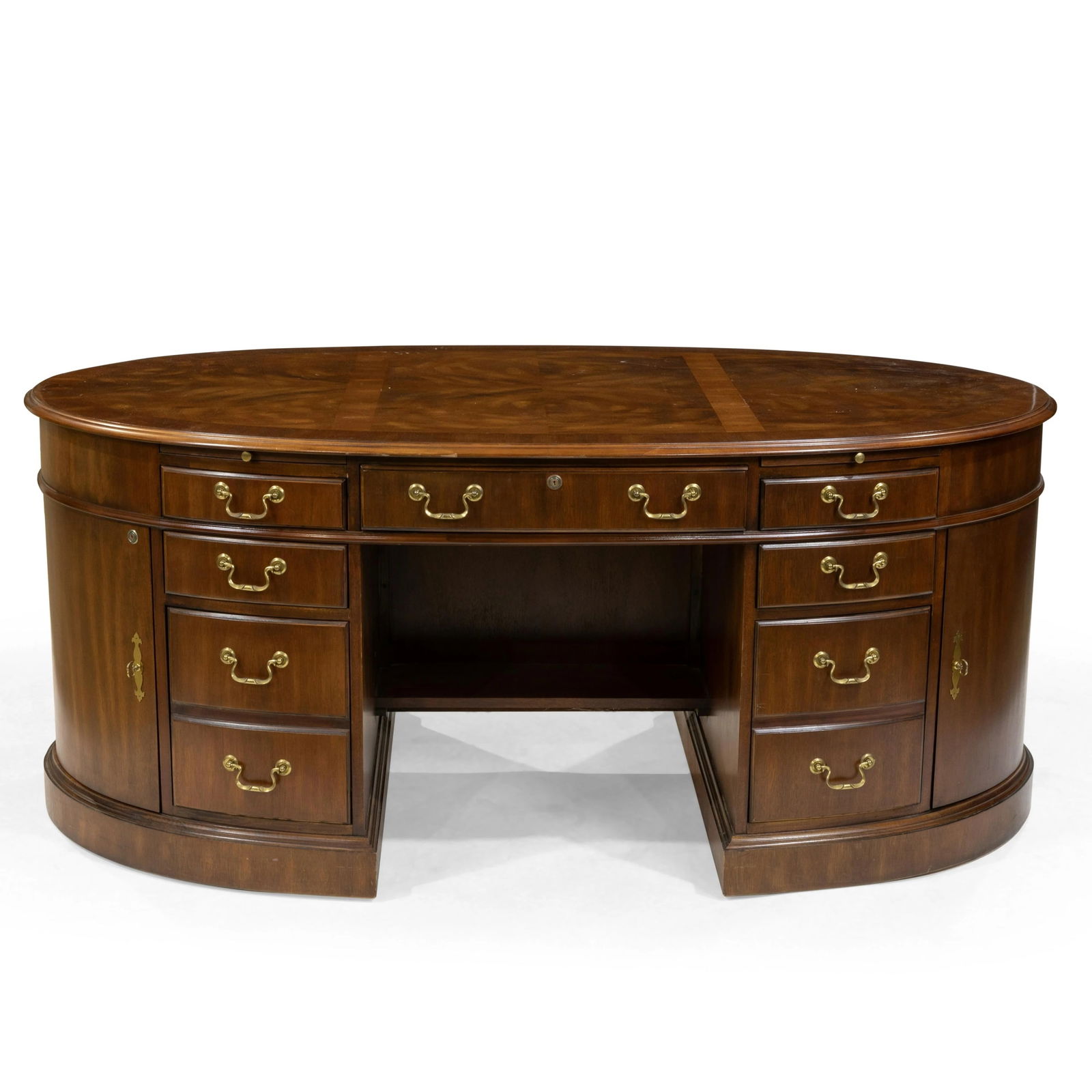 Banded Mahogany Oval Executive Desk: Banded mahogany oval executive desk. Dimensions - 30.5" x 70" x 40"