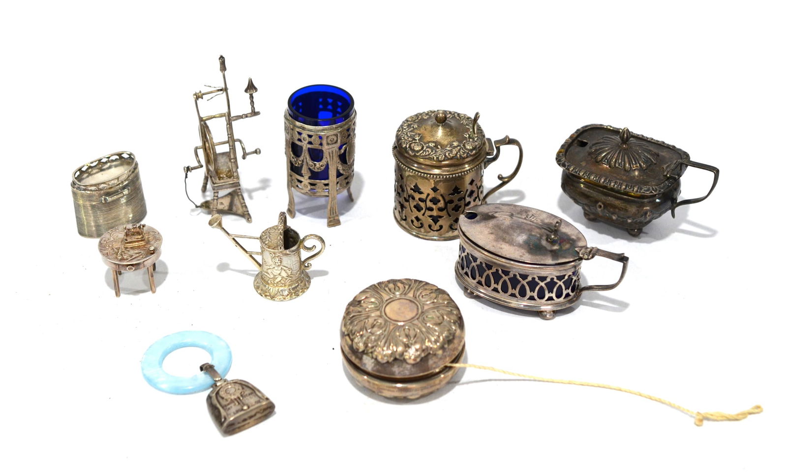 10 Pcs of Antique Silver Miniatures: Ten pieces 18/19th century antique silver miniature including some cup with liner, roller, watering pot, mini table with drawer, pill box , pendant and windmill, tallest one is 4"H, total weight about
