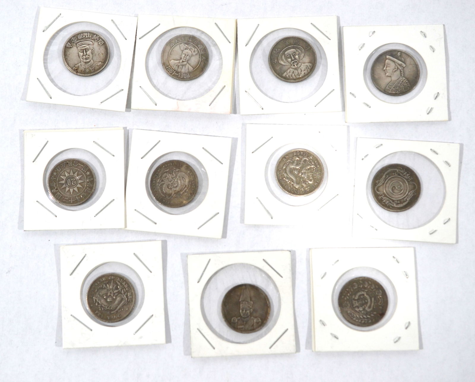 Eleven Old Chinese Silver Coins (1 of 11)