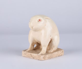 A White Glazed Pottery Figure of A Seated Hare