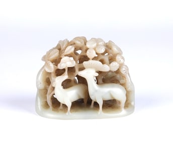 A White Jade Reticulated Deer Finial