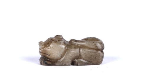 An Archaic Celadon Jade Figure of Tiger