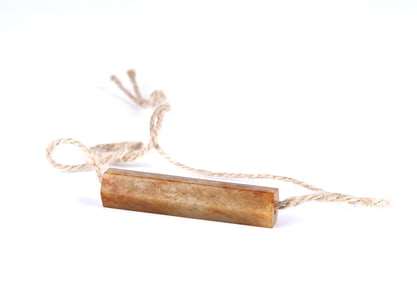 An Archaic Faceted Tubular Jade Bead