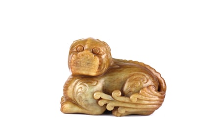 A Yellow Jade Figure of Foo Dog
