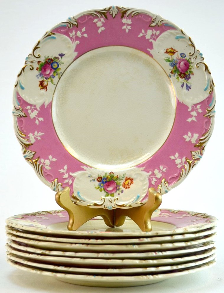 8 George Jones Pink Floral Plates: 8 George Jones "Chelsea" plates with pink and floral border. Marked. 9" dia.