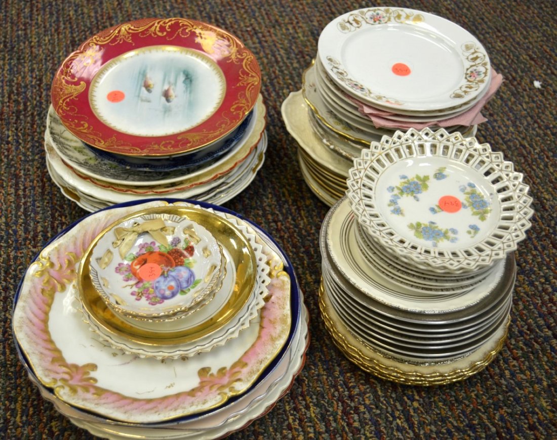 65 Pcs Porcelain Plates incl. Theodore Haviland: 65 porcelain plates including one with fish by Theodore Haviland. Largest; 10 1/2"