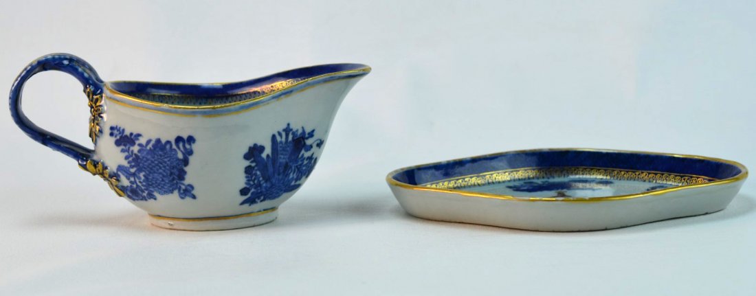Chinese Export Porcelain Blue & White Dish & Creamer: Chinese export porcelain four-sided dish underglaze-painted in blue with flowers, and trimmed in gold, the center with crest, some minor losses to the paint, 3/4" x 7 1/2, together with creamer, the e