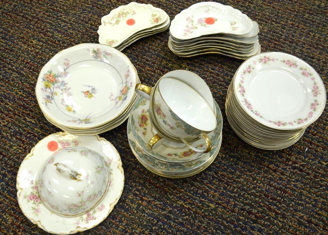 39-pc Porcelain Lot Including Haviland and Nippon: 39 porcelain pieces: Jyoto "Windsor" 3 teacups, 2 saucers, 2 - 6" bowls, Nippon 3 - 6 1/2" plates with gilded roses, J & S Bavaria 11 - 6" plates, Haviland 8" plate, 1 floral lid, 2 ring trays with ch