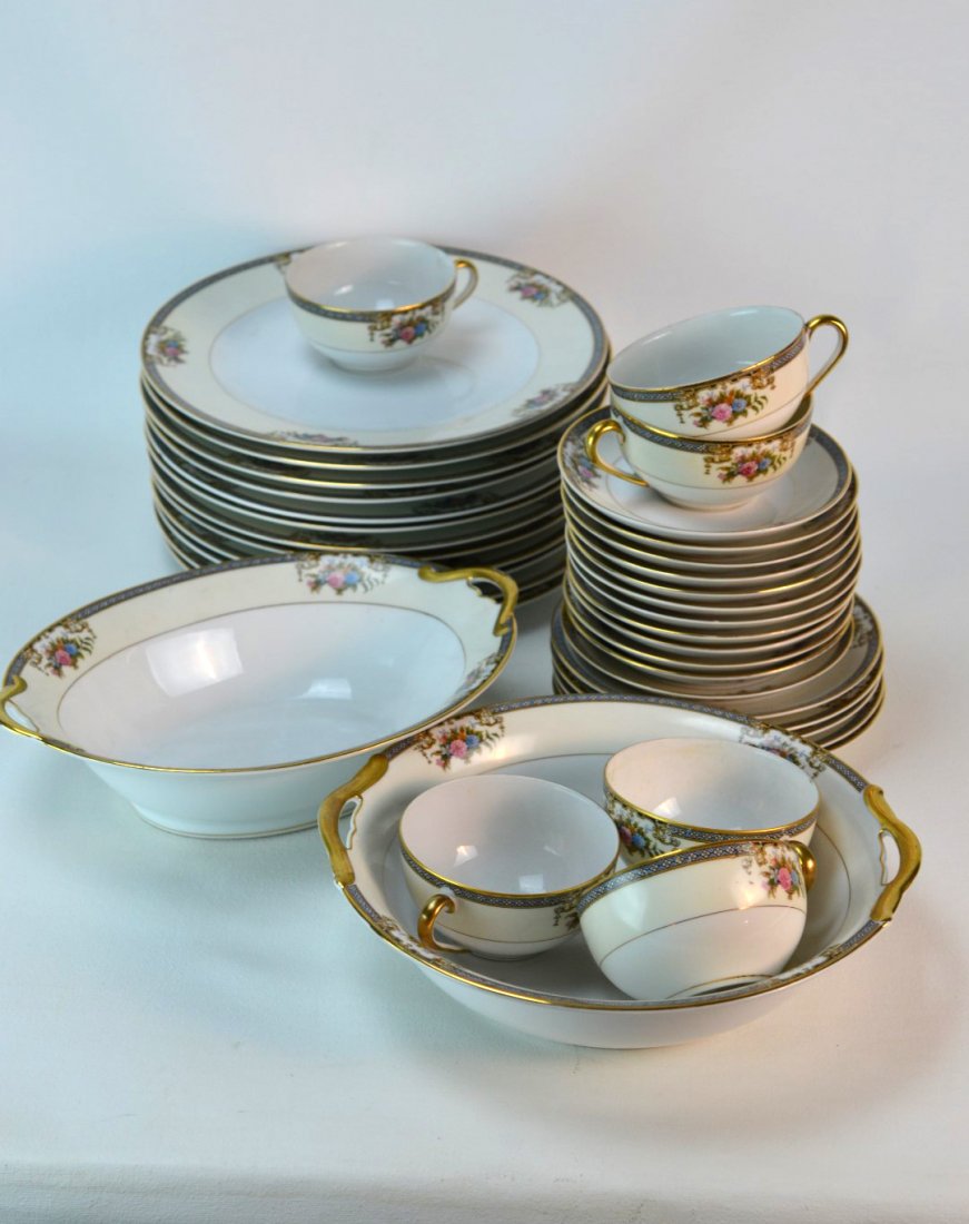36-pcs Noritake Grasmere Porcelain: 36-pcs Noritake "Grasmere" porcelain pieces; 1 serving bowl, 1 round serving bowl, 12 - 10" plates, 12 saucers, 6 teacups, 4 - 6" plates. Marked.
