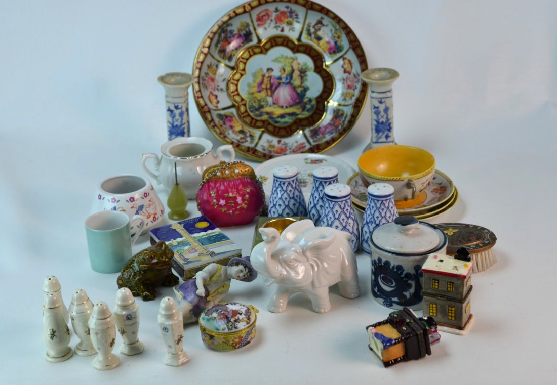 Box Lot Including Porcelain: Box lot of assorted items including porcelain candlesticks, boxes, lidded jar, a carved stone or onyx desk set piece, and more.