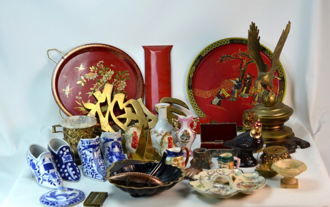 Box Lot Including Vintage Pipes: Box lot of assorted items including a cast bronze or metal eagle, art lamp, carved pipes, marble ashtray, and more.