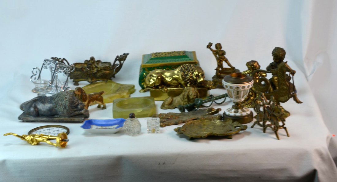 Box Lot of Assorted Items Including Cast-Metal Lions: Box lot of assorted items including cast-metal lions, stone or onyx desk pieces, porcelain ring dish, and more.