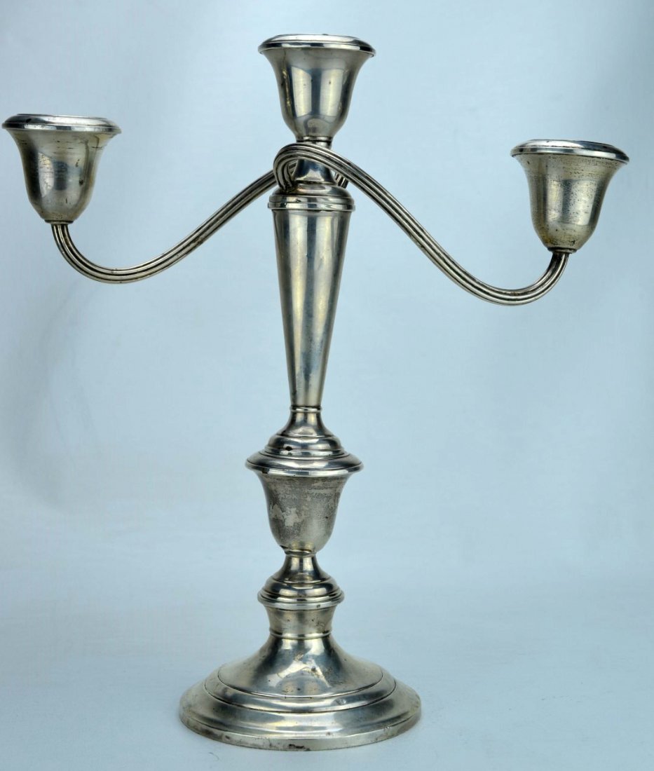 GORHAM Sterling silver three-light candelabra: GORHAM Sterling silver three-light candelabra. Marked GORHAM STERLING CEMENT FILLED REINFORCED WITH ROD OF OTHER METAL 808. 11 1/4'' x 10 1/4''