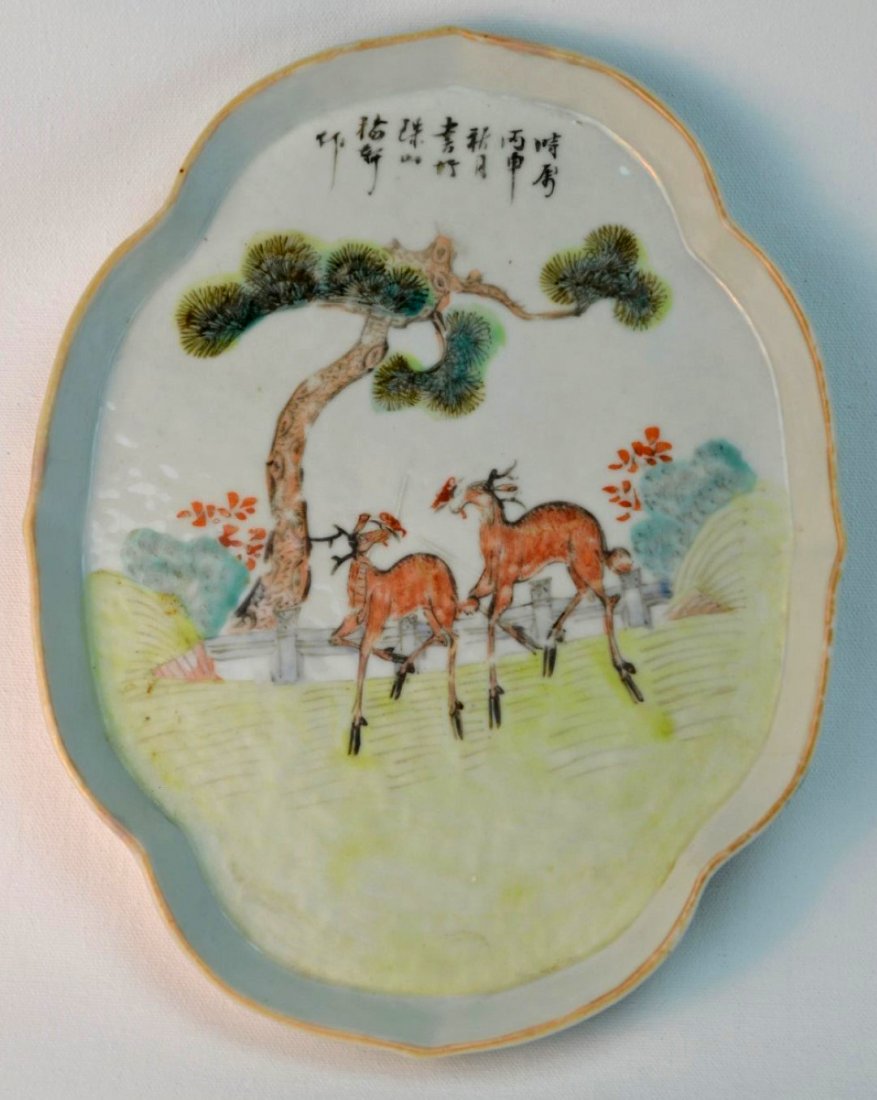 19th C Chinese Famille Rose Tray on Square wood table: CHINESE Carved hardwood side table painted green with inset porcelain tray, the tray painted with deer beneath a tree and Chinese writing, 19th century. 17''