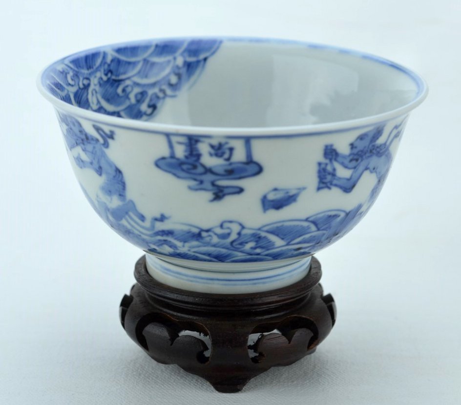 18th C Chinese Blue and white bowl w/ Mark: CHINESE PORCELAIN Blue and white bowl, both the interior and exterior painted with mythological figures standing atop dragons and clouds, 18th century. Underglaze blue four character mark in double ci