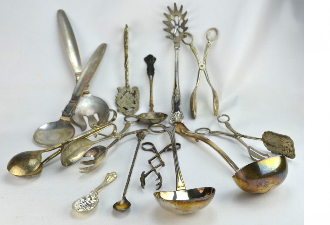 SILVERPLATE Etc. Fourteen serving utensils: SILVERPLATE Etc. Fourteen serving utensils including 12'' fork and spoon marked Original by AL Silver on Copper, two 14'' ladles, one with impressed seal marks, six sets of varied tongs, spoon with pi