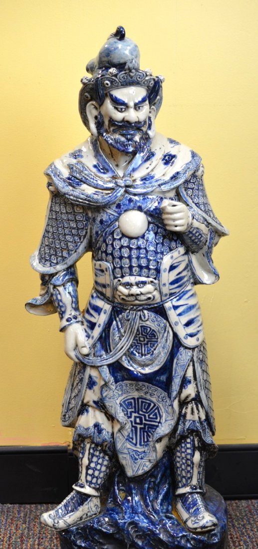 19th C Chinese blue and white man figure: 19th century Tall Chinese blue and white porcelain figure of a warrior. Missing weapon in hand. 34'' x 13''