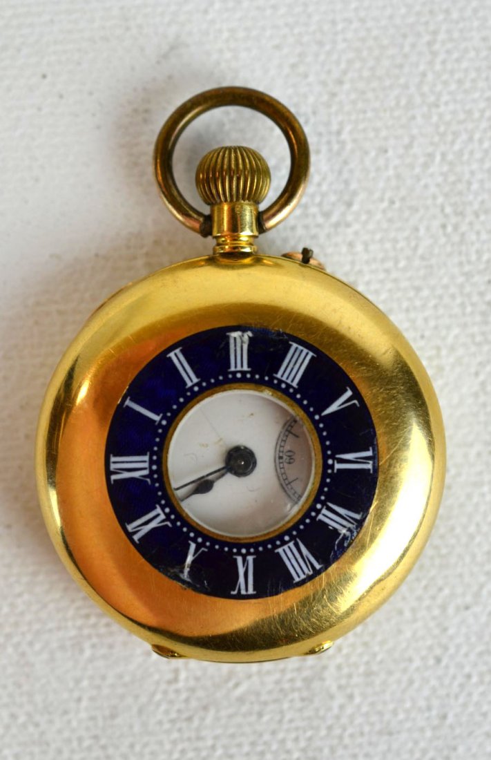 Thomas Wordley 18K Yellow Gold Pocket Watch: Thomas Wordley antique pocket watch of 18k yellow gold, with black enameled circle on the front, engraved initials on back. 23.3 dwt. (36.2 gs). Engraved makers name and address, 18K, Swiss Made. 1 1/