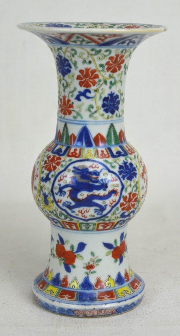 19th c. Chinese Ceramic Beaker Vase: Chinese ceramic beaker vase painted with gold, green, yellow, and copper red; designs include dragons, fruit, birds, and flowers. Six character blue stamp inside double circle on bottom. 19th c. Heigh