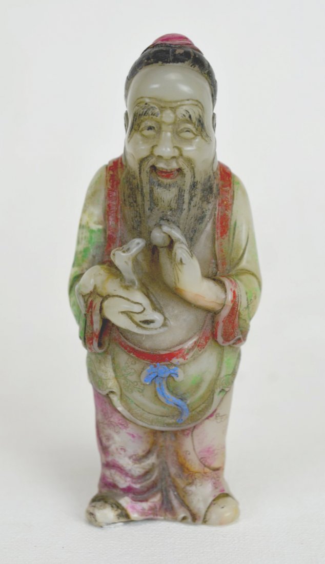 Qing Dynasty Carved Soapstone Figure: Fine and rare soapstone figure, holding a small animal, painted in rose, red, green, and blue, Xing Dynasty. Complete with fitted box. 4 1/4'' x 1 1/2''