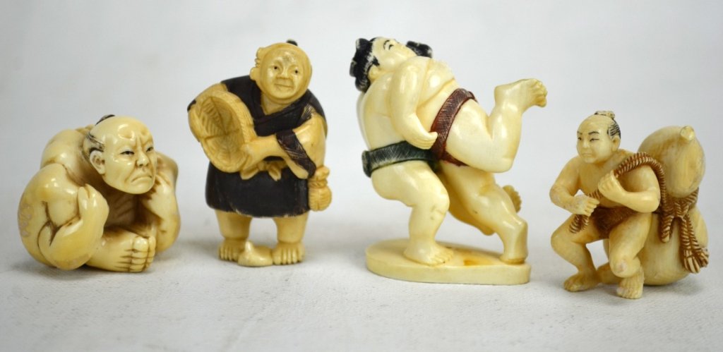 Four Japanese Antique Ivory Netsukes: Four antique ivory netsukes; three sumo wrestler figures and one farmer. All marked. 19th century. Dimensions: Biggest height - 2" Smallest height - 1 1/2" 19th century