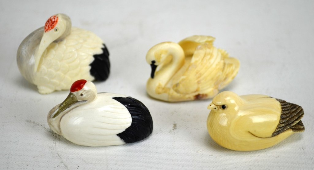 Four Japanese Antique Ivory Netsukes of Birds: Four antique ivory netsukes of birds including cranes and a swan. All marked. 19th century. Dimensions: Biggest height - 1 5/8" Smallest height - 1"
