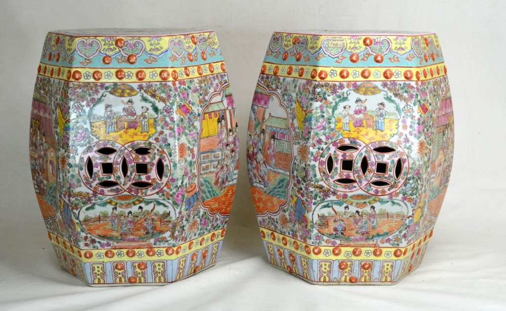 Pair of Chinese Famille Rose Porcelain Stools: A pair of hexagonal Chinese famille rose porcelain stools. Decorated with foliate decoration throughout and with scenes of figures. Six character copper red mark on bottom of each. Height - 18 1/2"