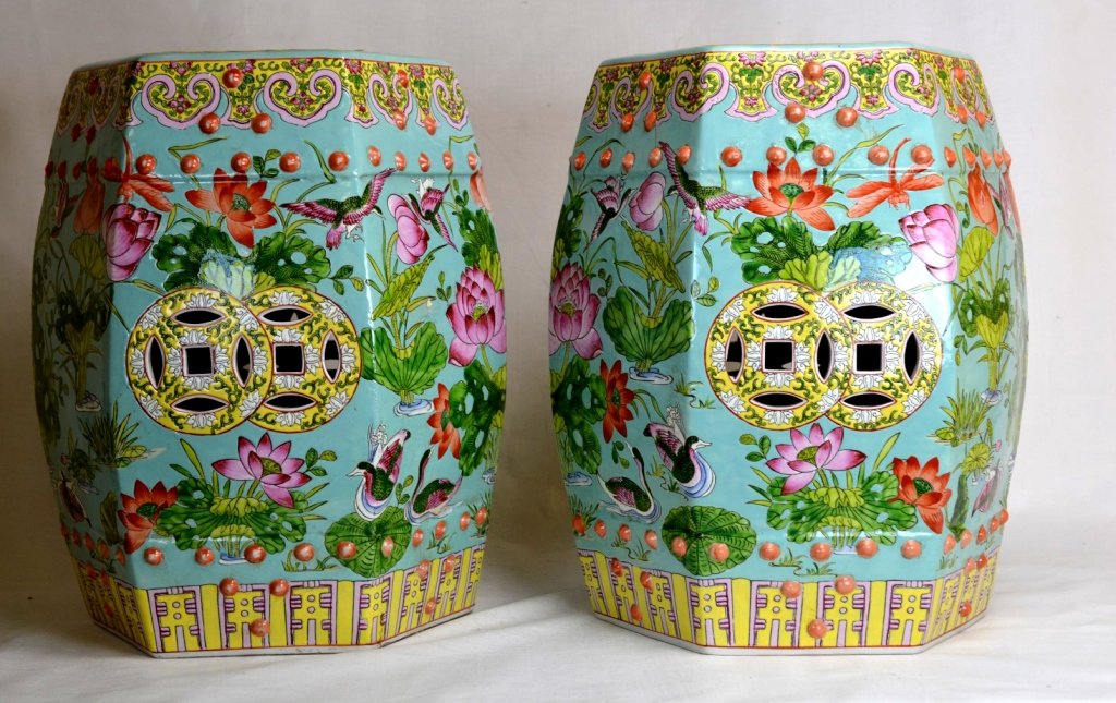 Pair of Chinese Porcelain Turquoise Stools: A pair of hexagonal Chinese porcelain stools decorated with a foliate design and birds atop a turquoise ground. Unmarked. Height - 18 3/4" 20th cen