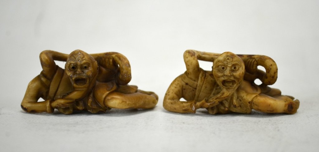 Two Japanese Bone Netsukes; "Elastic Man": Two antique bone netsuke titled "Elastic Man". All marked. 19th century. Dimensions: Both measure approximately 2 1/8" x 1"