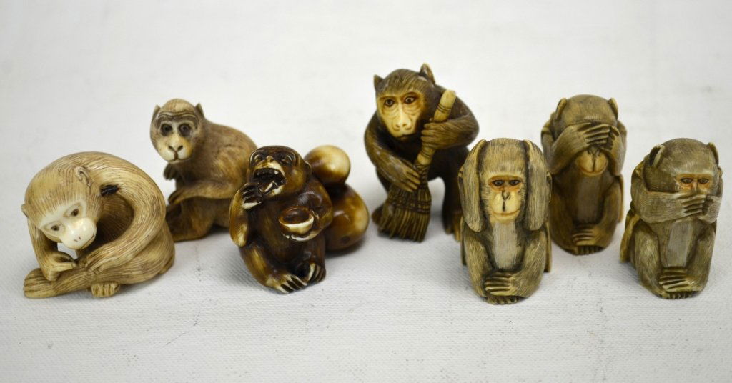 Seven Japanese Antique Ivory Monkey Netsukes: Seven antique ivory monkey netsukes; a trio of "see no evil, hear no evil, speak no evil" (one of which is marked), one of a seated monkey, another of a monkey pruning himself, a monkey with sweeping