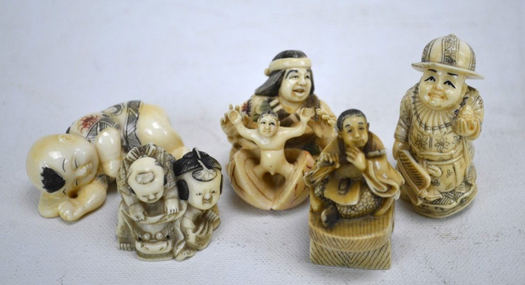 Five Japanese Antique Ivory Netsukes of Youths: Five antique ivory netsukes depicting: a mother and son on a lion, mother playing with her boy in a clam shell, a boy on a shoe, a boy general, and a sleeping baby. All marked. 19th century. Dimension