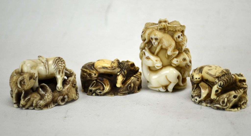 Four Japanese Antique Ivory Zodiac Netsukes: Four antique ivory zodiac netsukes; two Zodiac depictions, and two megyokusis Zodiac. All marked. 19th century. Dimensions: Biggest height - 1 7/8" Smallest height - 1/2"
