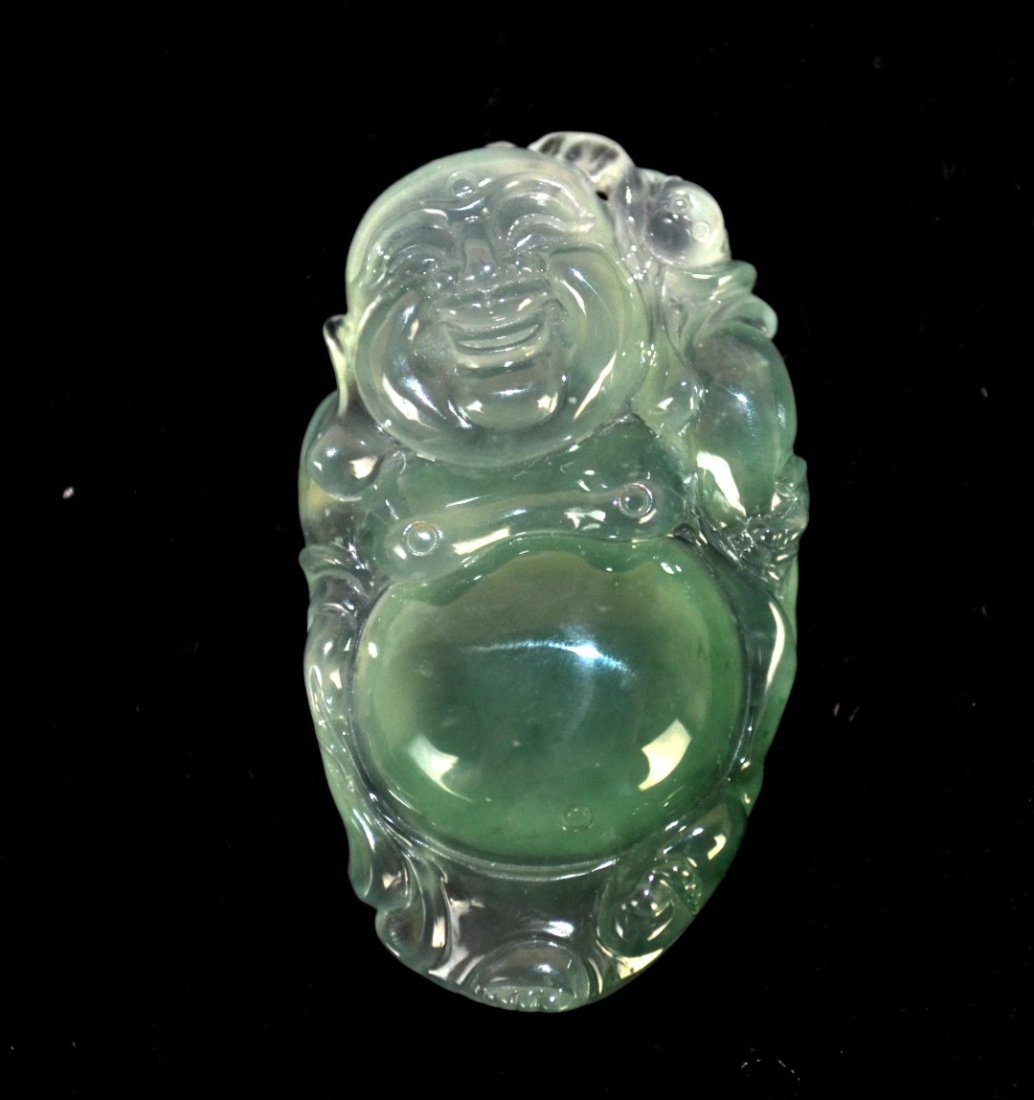 Natural Carved Jadeite Buddha Pendant: Natural carved green jadeite buddha pendant. Guaranteed Type "A". 36 mm x 20 mm x 8mm approx. Weight: 9 g.